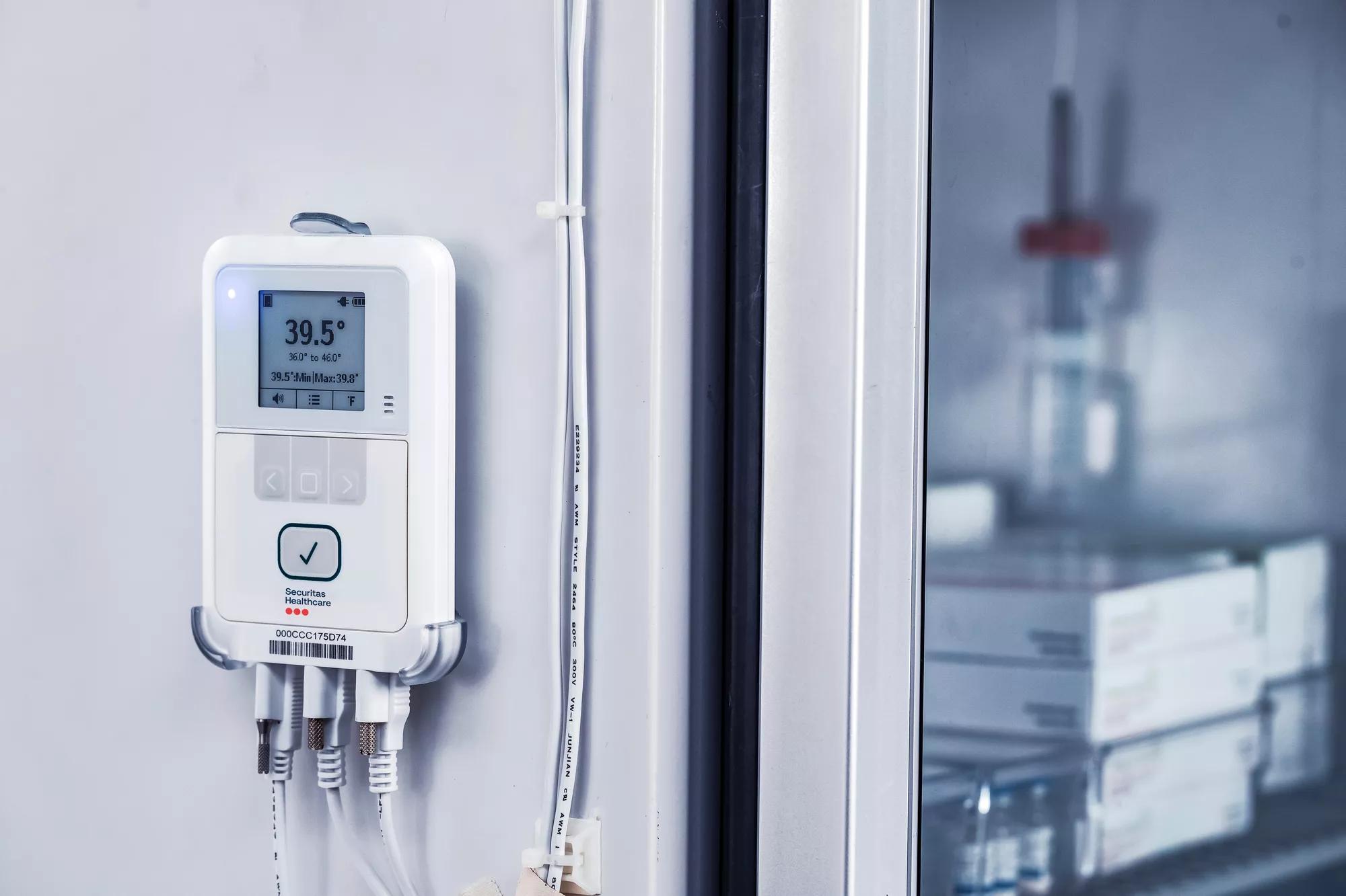 Securitas Healthcare T15 temperature (temp) and environmental monitoring on  refrigerator. 