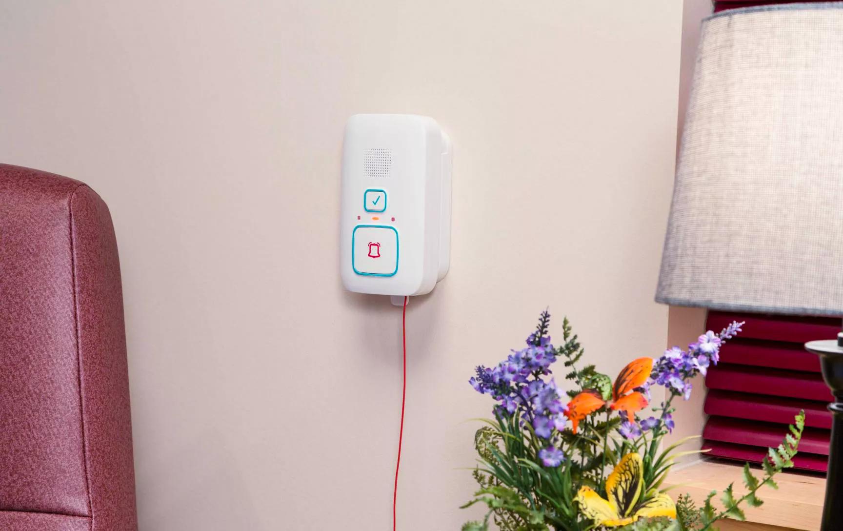 Arial Wi-Fi Emergency Call Station attached to the wall for easy resident distress alerting and monitoring.