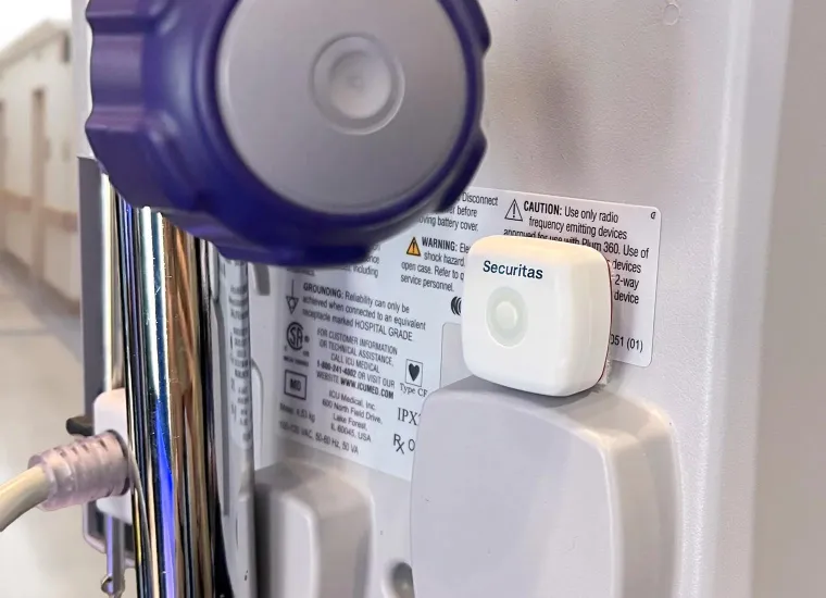 Securitas Healthcare RTLS Asset Management solution via T22 tag tracking location on infusion pump, using BLE Bluetooth Low Energy