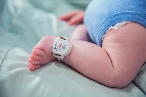 Hugs infant protection tag and band on infant's ankle. Securitas Healthcare.