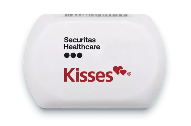 Front view of Kisses Mother Badge, for use with Securitas Healthcare's Hugs infant protection solution.