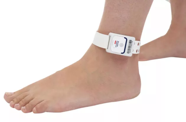 The T2sp Patient Protection band worn on patient's ankle. Securitas Healthcare.