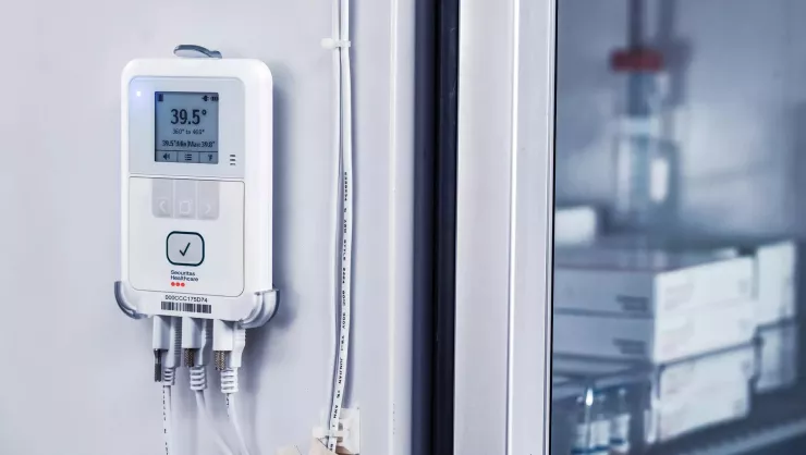 Securitas Healthcare T15 temperature (temp) and environmental monitoring on  refrigerator. 