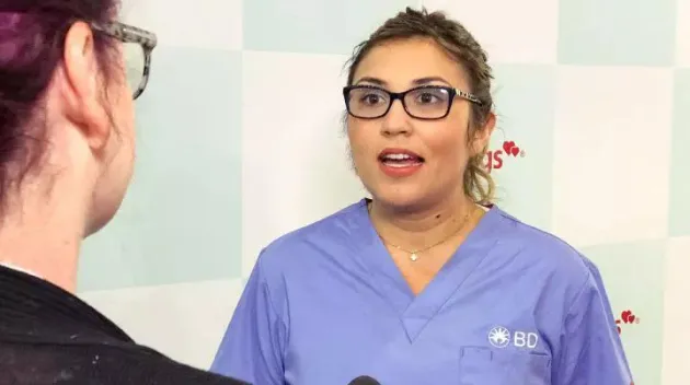 Healthcare worker being interviewed
