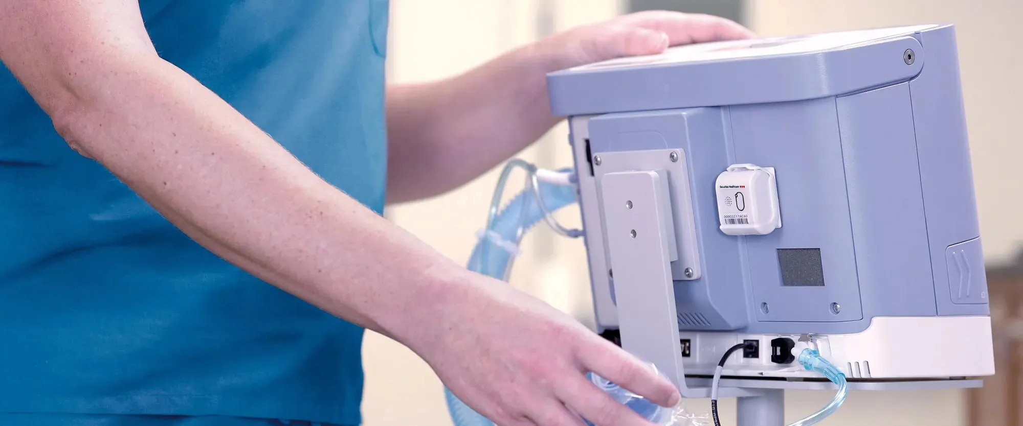 Nurse retrieves hospital ventilator tracked by Securitas Healthcare T12sb asset management tag