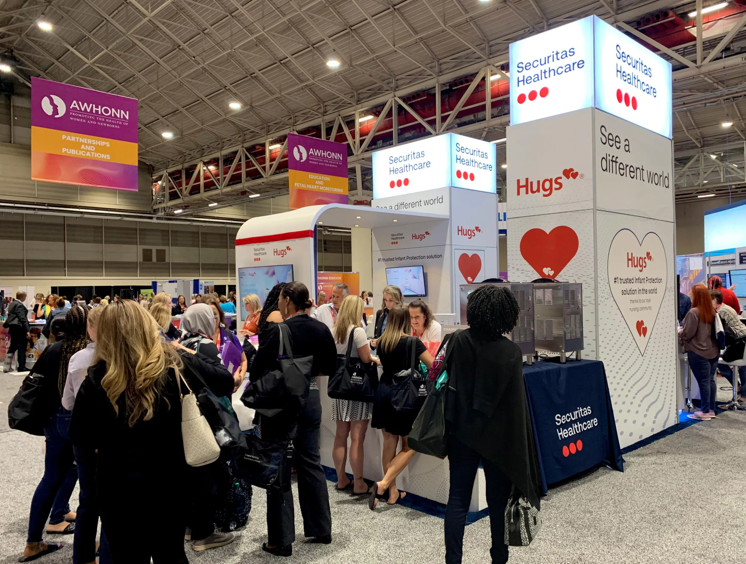 Securitas Healthcare Hugs infant protection booth at AWHONN Convention event trade show floor