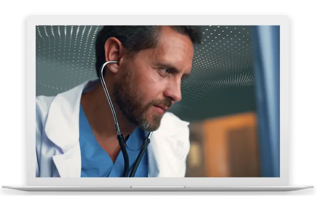 Close up of a male caregiver in a white lab coat with a stethoscope