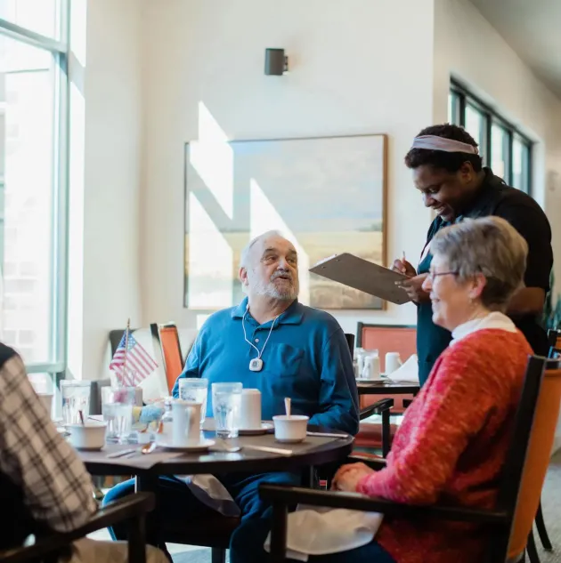 Senior living community residents ordering at mealtime. Securitas Healthcare Arial emergency and nurse call.