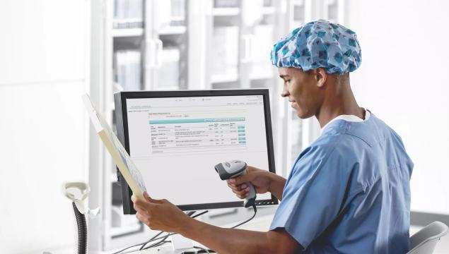 Scanning clinical supplies into Securitas Healthcare's SpaceTRAX point-of-use inventory management system