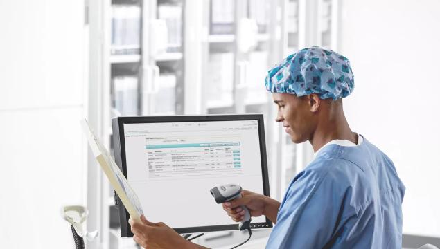 Scanning clinical supplies into Securitas Healthcare's SpaceTRAX point-of-use inventory management system