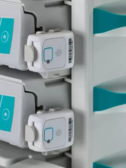 Securitas Healthcare T2s RTLS badge attached to pump.