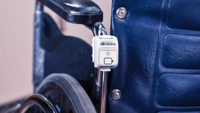 T2su asset management tag attached to a wheelchair. Securitas Healthcare asset tracking.